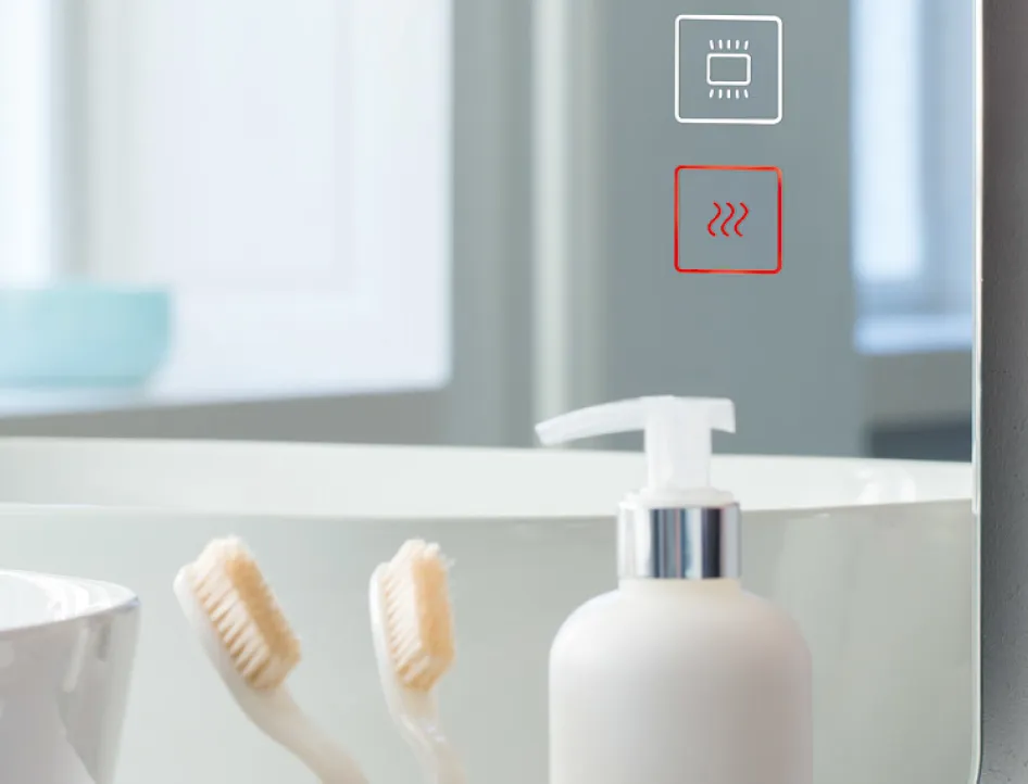 Nahaufnahme eines Badezimmerspiegels mit zwei Touch-Bedienfeldern für Licht und Heizung, das untere Symbol ist rot hervorgehoben.